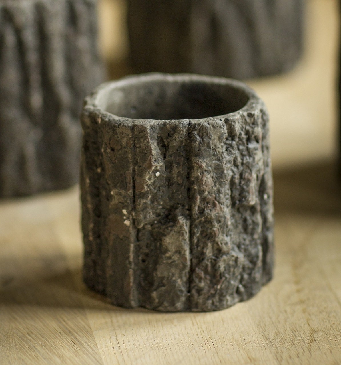 Small Round Shaped Concrete Pot with Bark Like Detailing