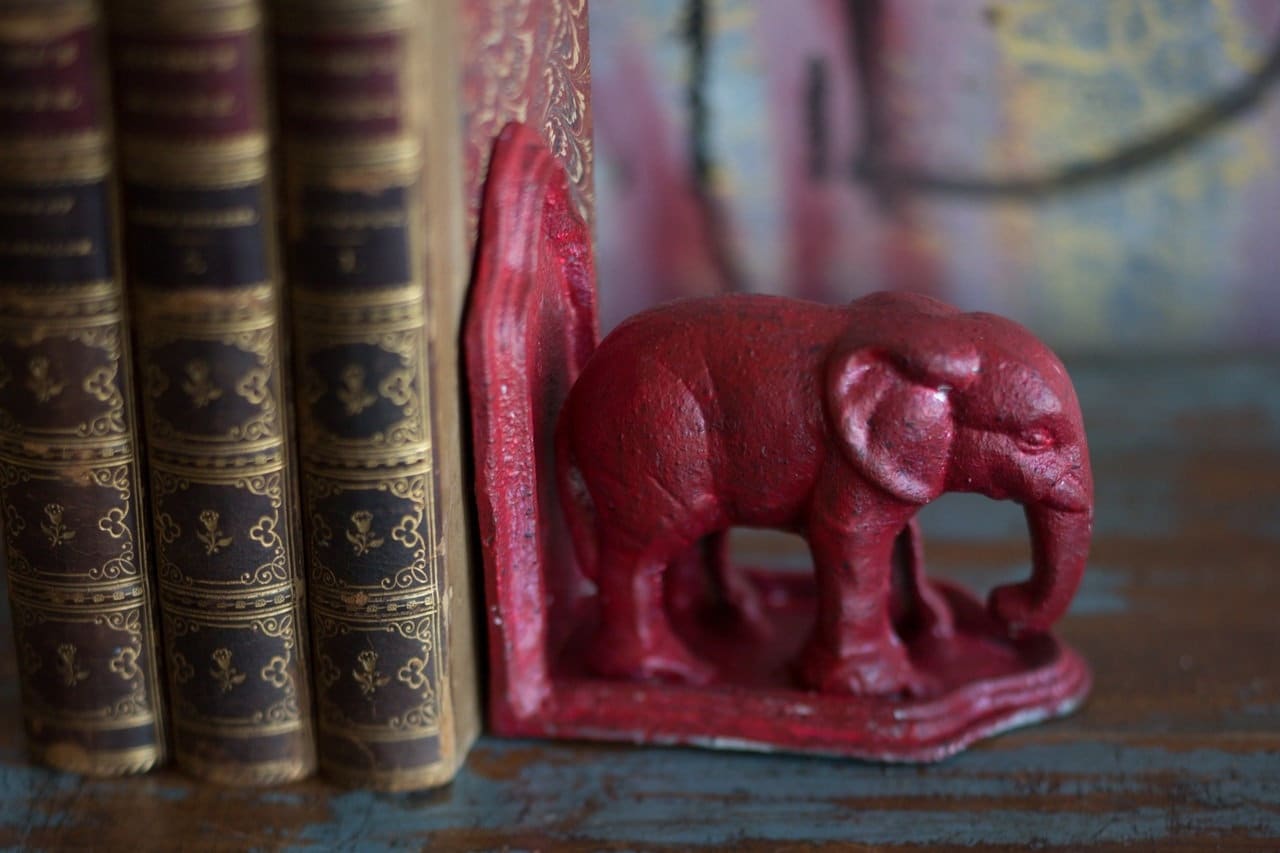 Vintage Style Cast Iron Elephant Bookend in Antiqued Red Finish