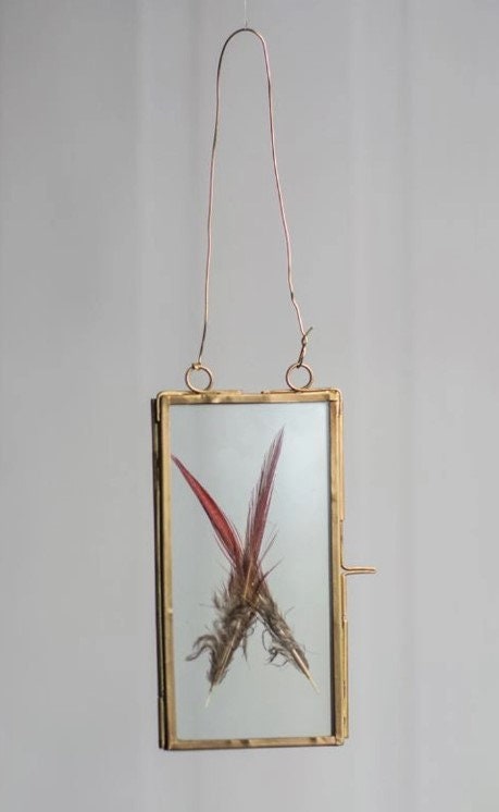 Brass Frame With Hanging Loops Includes feathers picked at random