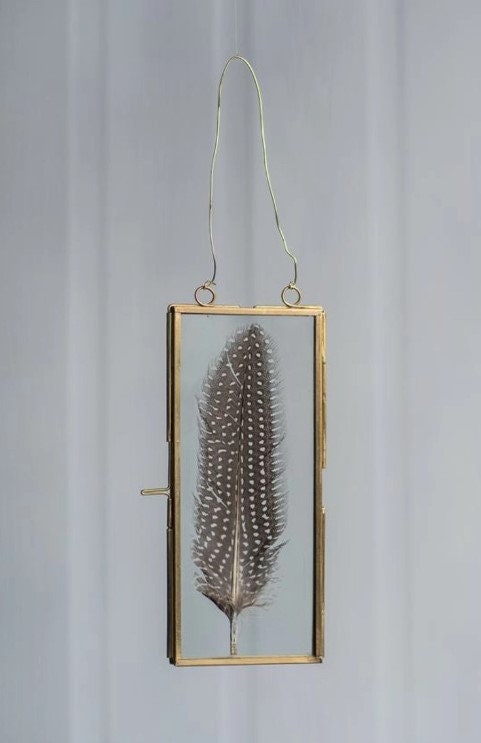 Brass Frame With Hanging Loops Includes feathers picked at random